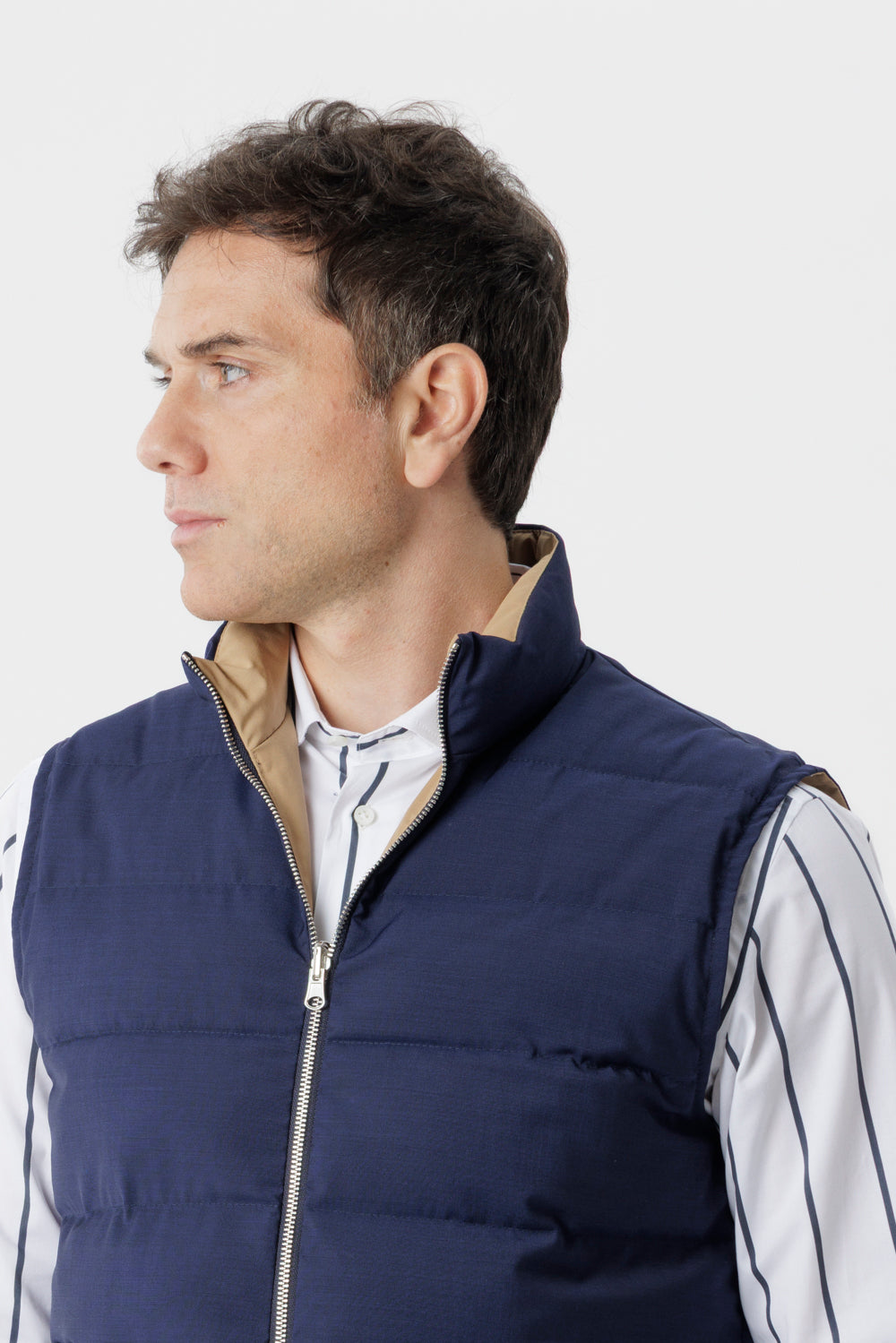 Reversible two-material gilet with regenerated navy blue cashmere padding