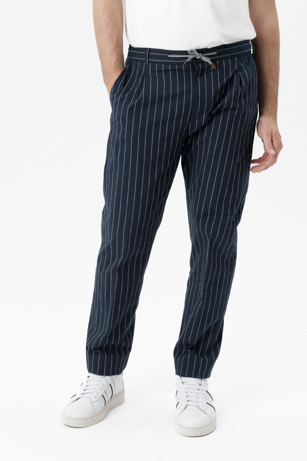 Blue pinstriped and embossed stretch cotton drawstring trousers