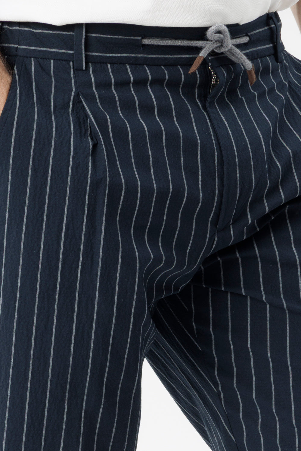 Blue pinstriped and embossed stretch cotton drawstring trousers
