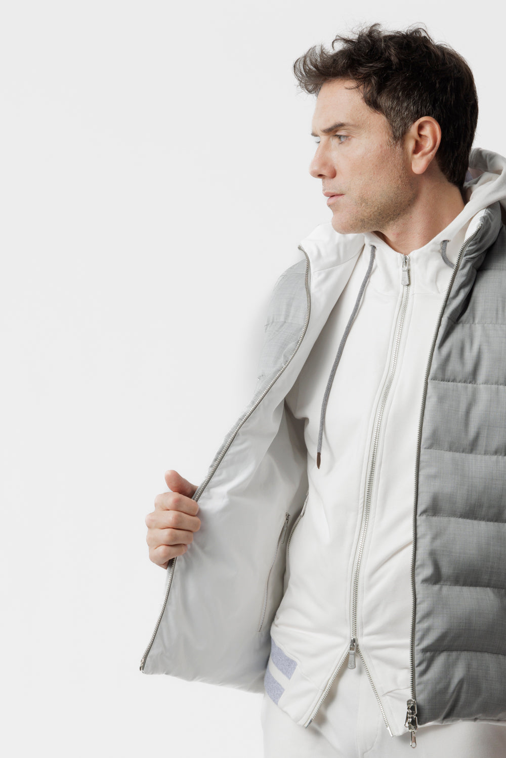 Reversible two-fabric gilet with light grey regenerated cashmere padding